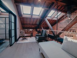 white wooden table near brown wooden chairs