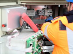 A Man Maintaining an Inverter